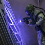 Hot zinc operative in action - close-up