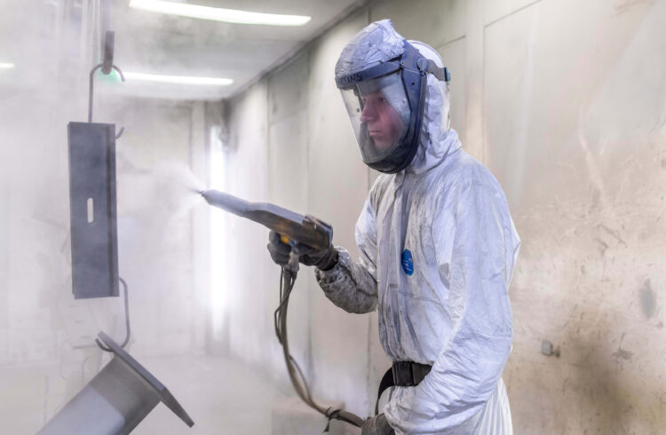 Powder coat operative in action